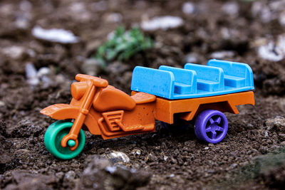 Close-up of toy car on field