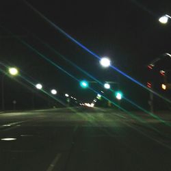 Illuminated street light at night