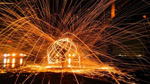 Low angle view of wire wool at night