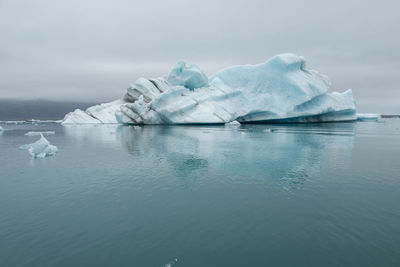 Floating icebergs in jokulsarlon glacial lagoon, iceland. global warming