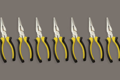 High angle view of red paint against white background