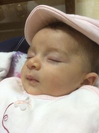 Close-up portrait of cute baby sleeping
