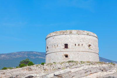 Fort on mamula island in kotor bay from montenegro . fortin de lastavica , islet in the adriatic sea