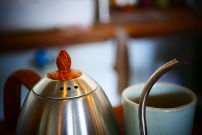 Close-up of coffee on table at home