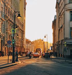 City street and buildings against sky