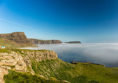 Scenic view of sea against clear blue sky