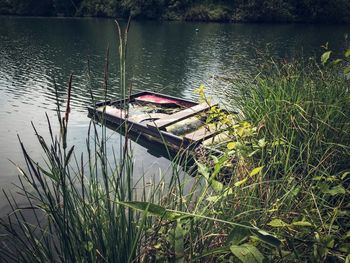 Boat moored in lake