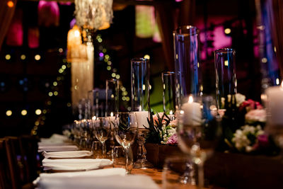 Luxury table settings for fine dining with and glassware, beautiful blurred background. 