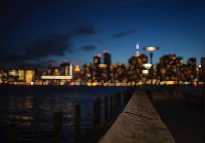 Illuminated city buildings at night