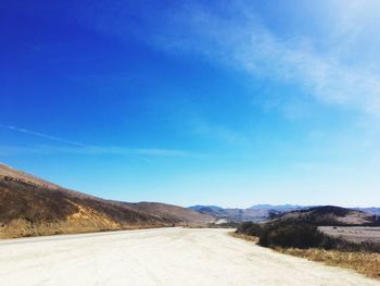 Scenic view of landscape against clear blue sky