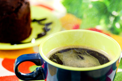 Close-up of coffee cup on table