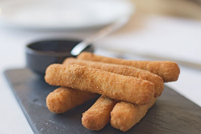 Fried mozzarella cheese fingers.