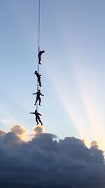 Low angle view of silhouette against sky