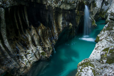 Mountain river soca canyon in autumn at triglav national park in slovenia with fall colors