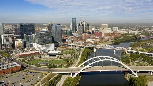 High angle view of buildings in city against sky