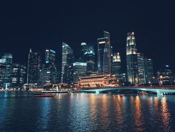 Illuminated city lit up at night