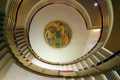 Low angle view of spiral staircase in building