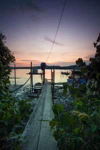 Scenic view of sea against sky at sunset