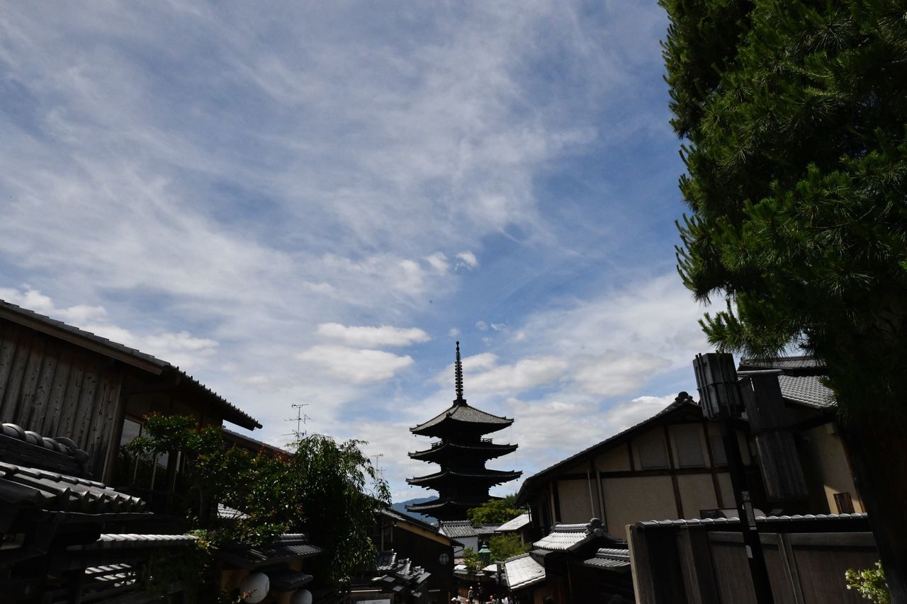 architecture, built structure, building exterior, building, sky, cloud - sky, tree, low angle view, nature, place of worship, plant, religion, day, no people, belief, spirituality, outdoors, house, residential district, spire