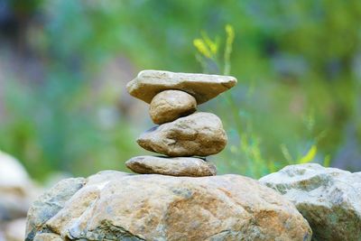 Close-up of stone stack on rock