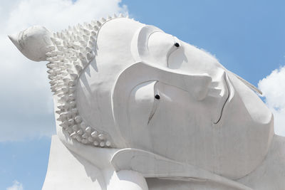 Low angle view of statue against sky