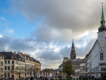 Buildings in city against sky