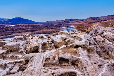 Scenic view of rocky mountains against sky