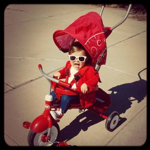 High angle view of boy riding bicycle