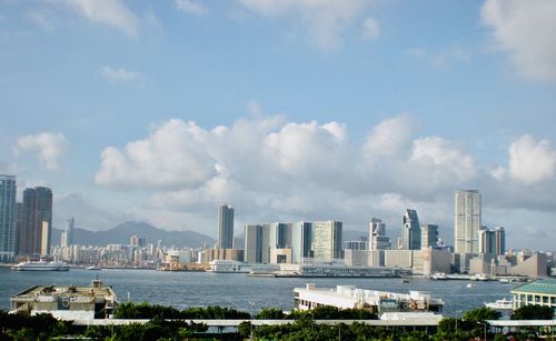 Modern buildings in city against sky