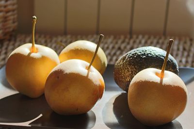 Close-up of fruits on table
