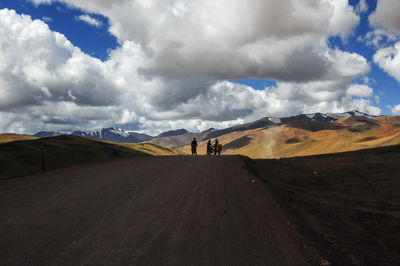 Beautiful and spectacular mountains and meadows under the blue sky and white clouds