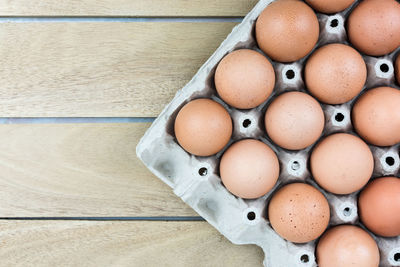 High angle view of eggs in crate