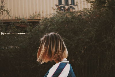 Side view of young woman