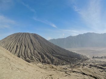 Panoramic view of volcanic landscape against sky