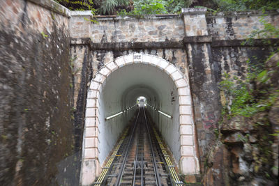 View of footbridge in tunnel