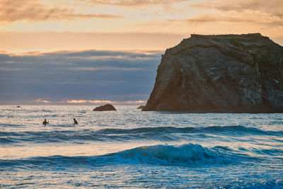 Scenic view of sea against sky during sunset