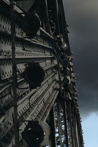Low angle view of building against cloudy sky