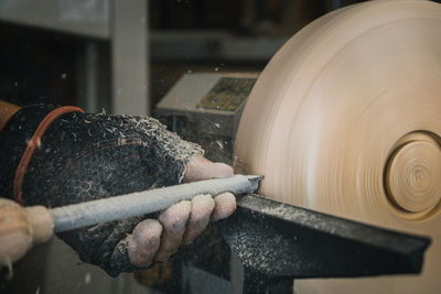 Man working on barbecue grill