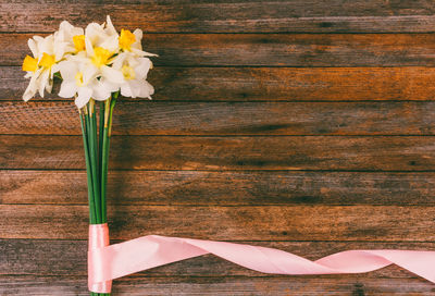 Close-up of white flower vase on table