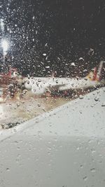 Full frame shot of wet window in rainy season