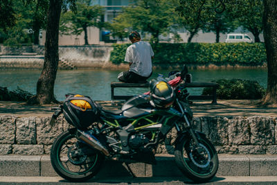 Man riding motorcycle on street