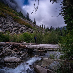 Scenic view of waterfall against sky