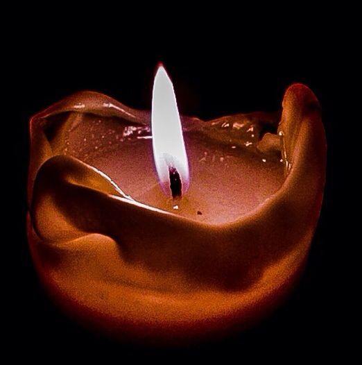 black background, studio shot, close-up, copy space, still life, single object, cut out, indoors, burning, food and drink, dark, flame, freshness, no people, night, glowing, heat - temperature, food, red, two objects