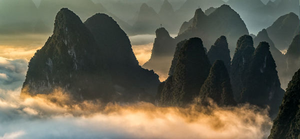 Panoramic view of landscape against sky during sunset