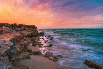 Scenic view of sea against sky during sunset