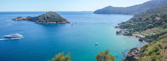 High angle view of bay against clear sky