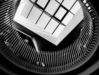 Low angle view of spiral staircase in building