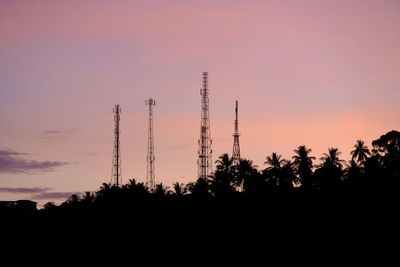 Low angle view of silhouette trees against sky during sunset