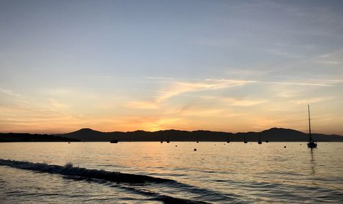 Scenic view of sea against sky during sunset