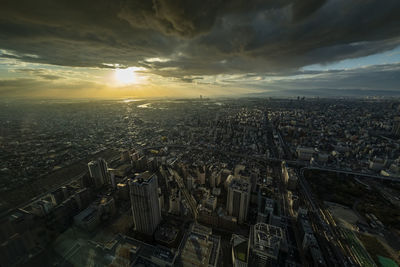 High angle view of city against sky during sunset